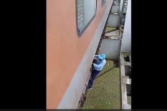 Locomotive pilot risks life to fix air leakage under train on railway bridge | Watch 5 Locomotive pilot risks life to fix air leakage under train on railway bridge | Watch