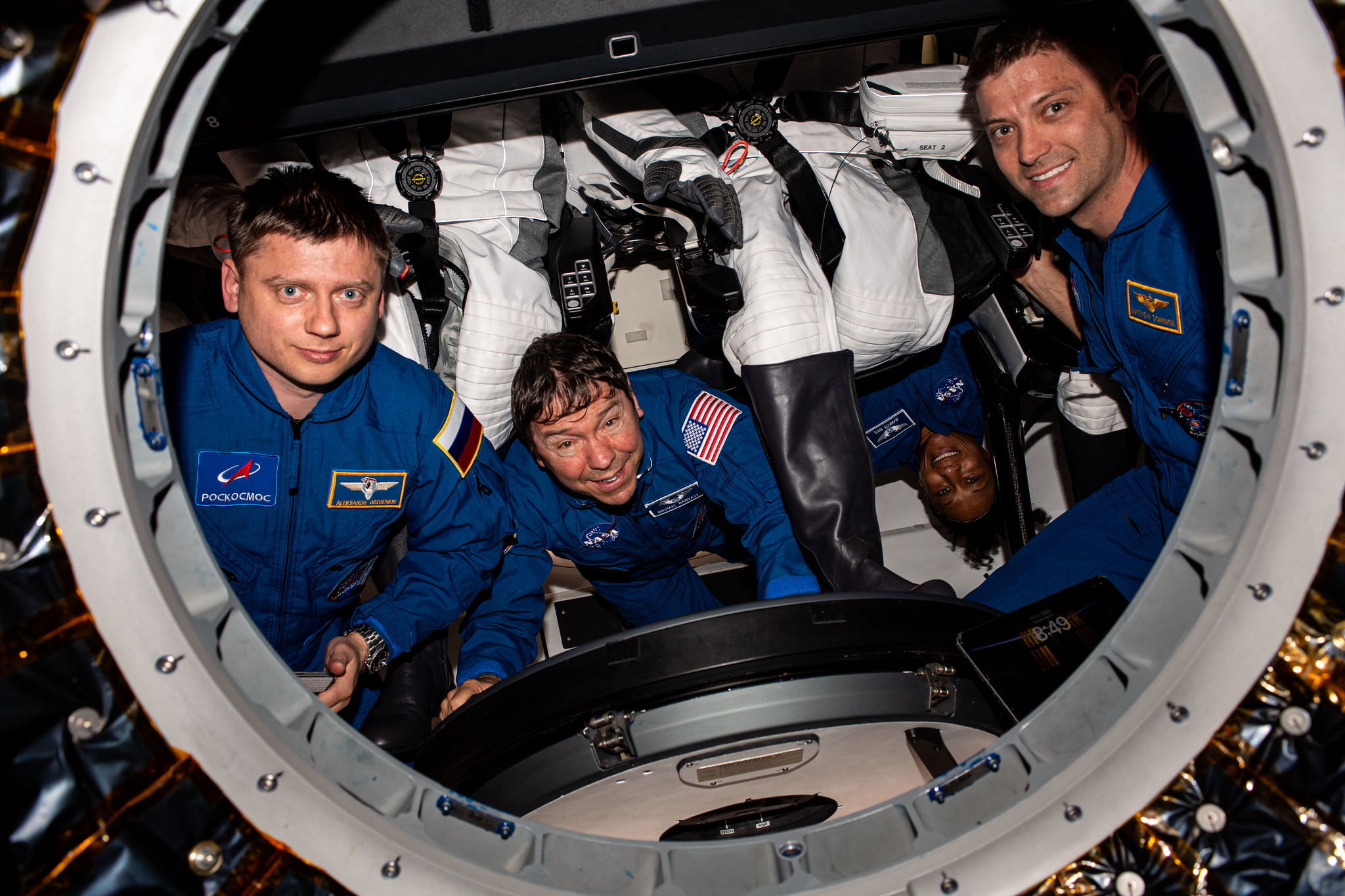 The Crew 8 Dragon passengers from left to right, Roscosmos Cosmonaut Alexander Grebenkin and NASA astronauts Mike Barratt, Jeanette Epps and Matt Dominick. (Image Credit: NASA Johnson). 