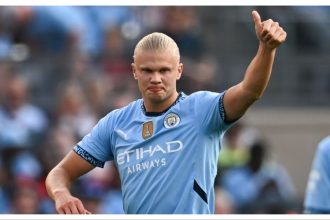 Erling Haaland goes past Neymar in Champions League during Manchester City’s triumph