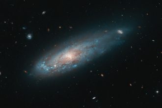 Hubble captures galaxy distorted by unimaginable forces