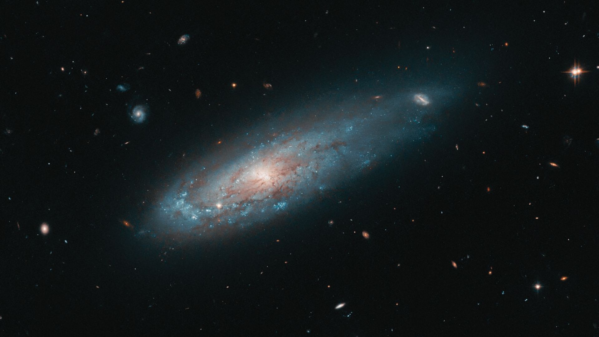 Hubble captures galaxy distorted by unimaginable forces