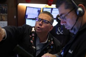 Global stocks slip, notch weekly loss on US election nerves; crude oil gains