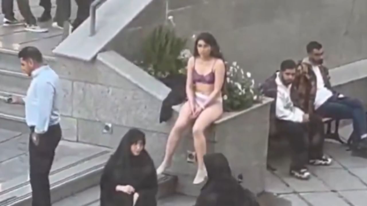 Iran woman strips at university to protest against strict Islamic dress code | Video