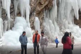 Uttarakhand: Tourists flock to frozen waterfalls in Niti Valley amid freezing cold