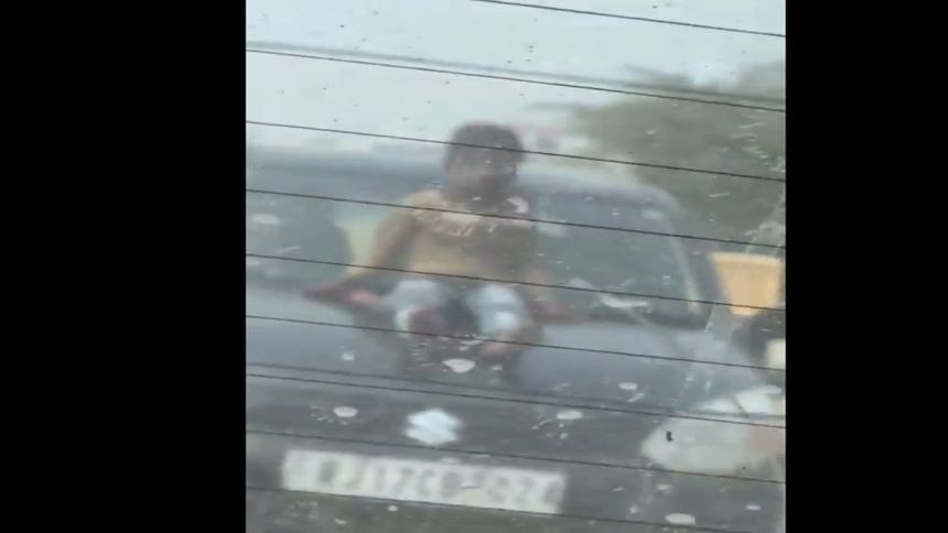 Rajasthan man drives car with 5-year-old son sitting on bonnet, arrested | Video