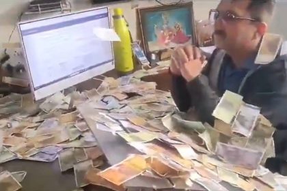‘How much will you eat…’: Angry men throw notes at ‘corrupt’ Gujarat officer |Watch