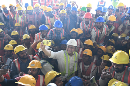 Ashwini Vaishnaw joins bullet train workers on ground, clicks selfies with them