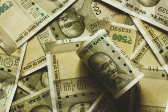 Panicked over Vigilance raid, Odisha engineer throws bundles of dirty money outside his flat – Video