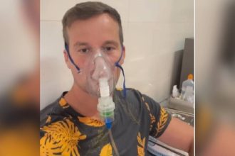 American vlogger’s Indian train trip ends in Hospital, blames ‘toast’ lungs on 15-hour sleeper class journey and Varanasi
